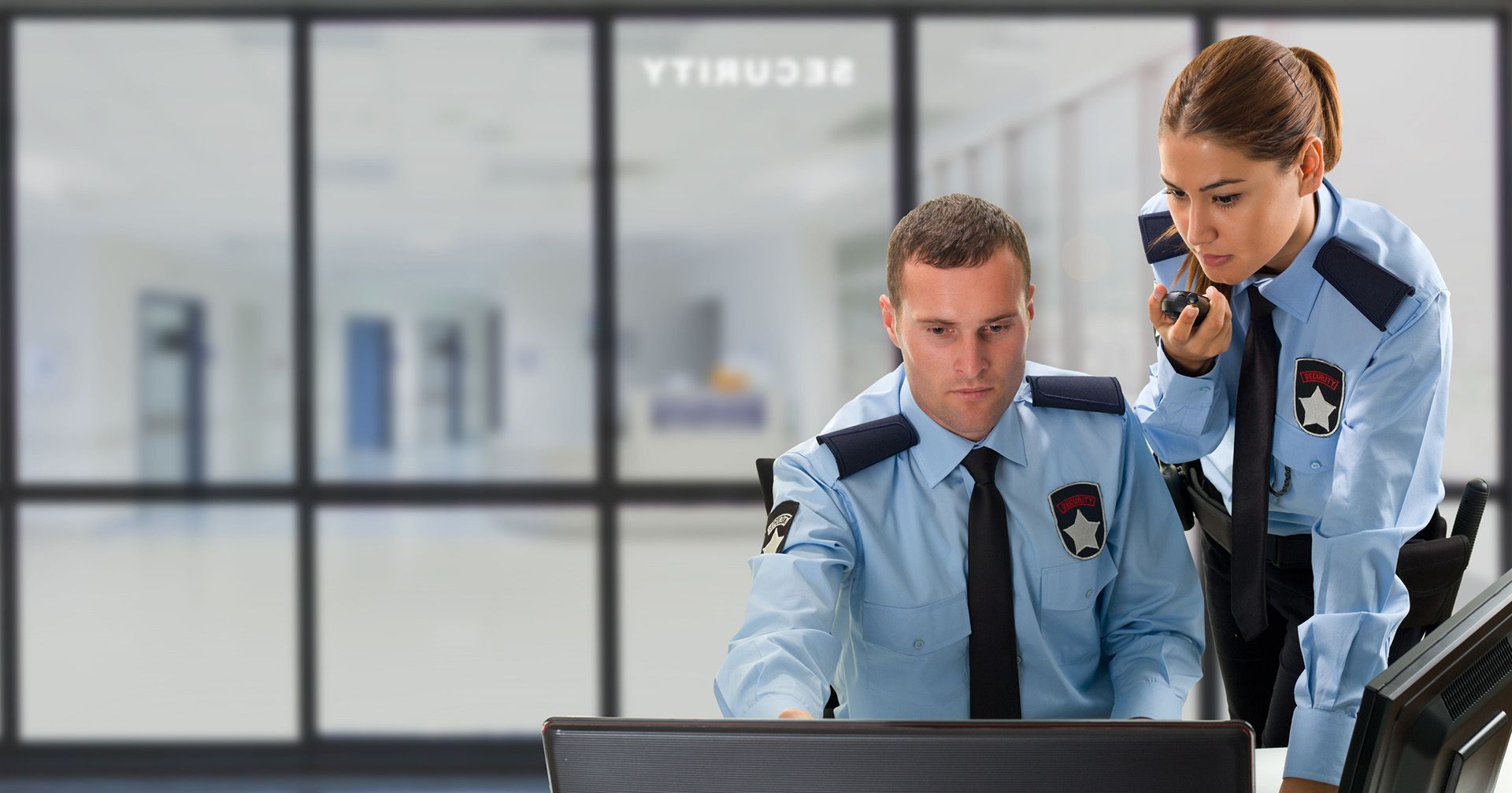 Security professionals reviewing site information